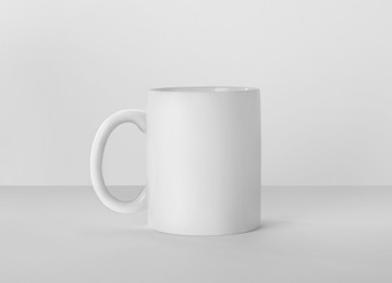 Image of Blank ceramic mug on white background. Mockup for design