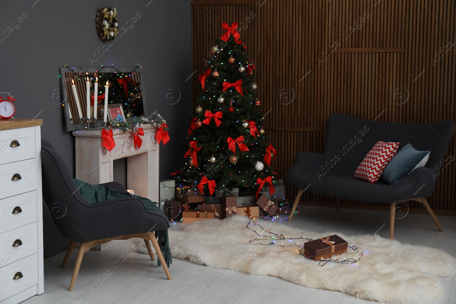 Photo of Stylish living room interior with decorated Christmas tree