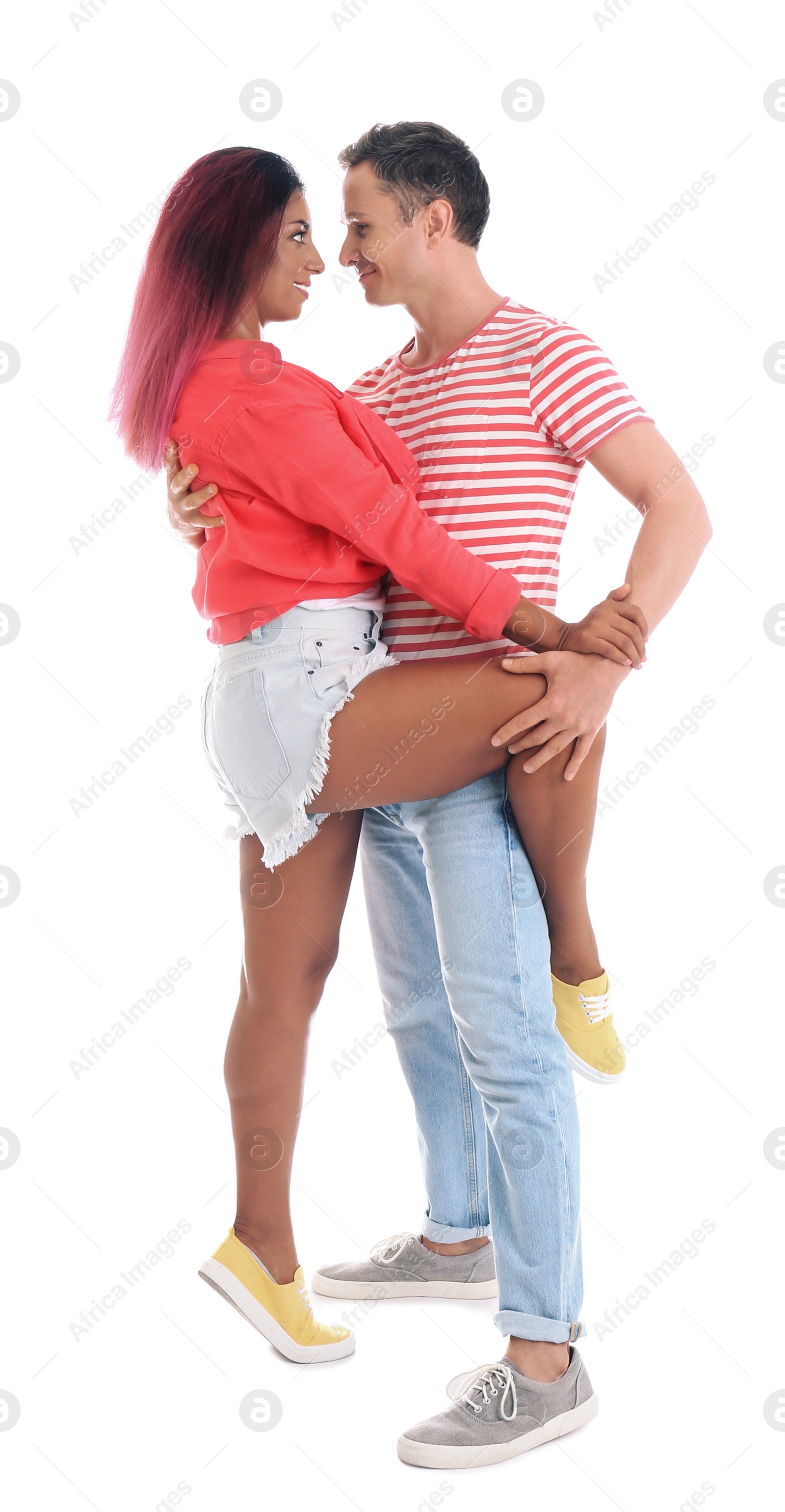 Photo of Beautiful lovely couple dancing on white background