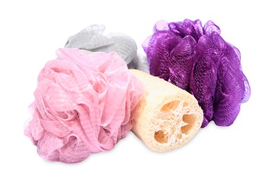 Photo of New shower puffs and loofah sponge on white background. Personal hygiene