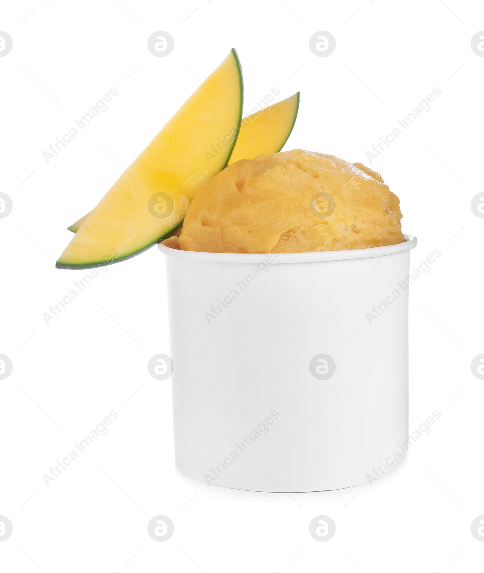 Photo of Delicious yellow ice cream with mango in paper cup isolated on white