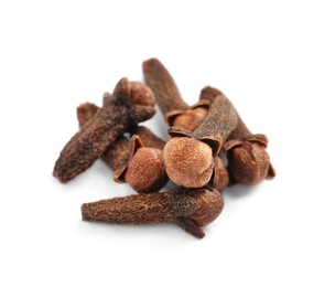 Photo of Pile of aromatic dry cloves on white background