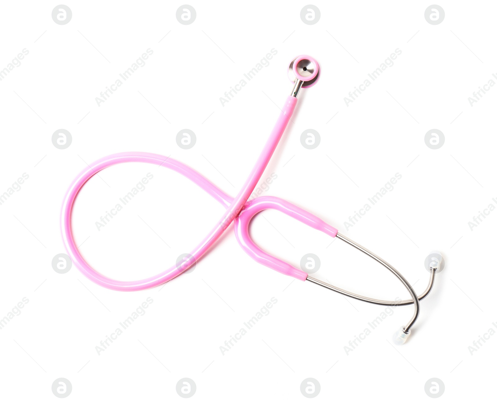 Photo of Pink stethoscope as awareness ribbon isolated on white, top view. Breast cancer concept