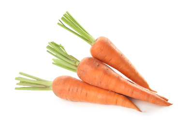 Pile of fresh ripe carrots isolated on white