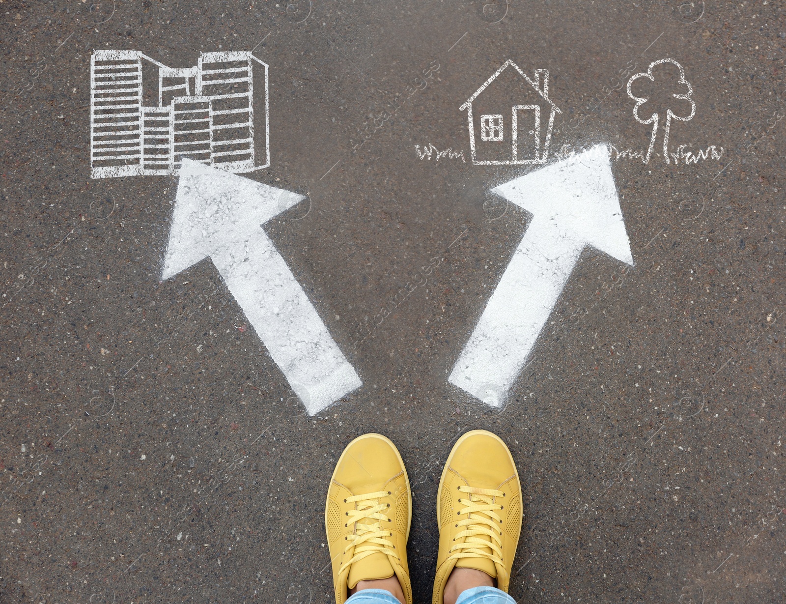 Image of Top view of woman standing near arrows on asphalt, closeup. Concept of balance between life and work 