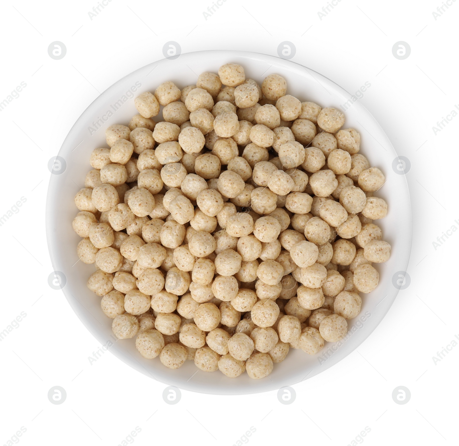 Photo of Tasty cereal balls in bowl isolated on white, top view