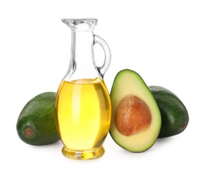 Photo of Cooking oil and fresh avocados isolated on white