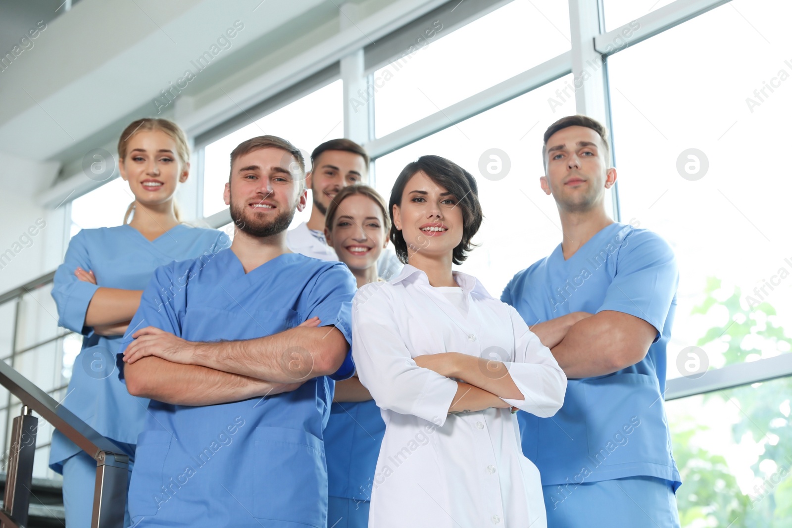 Photo of Team of doctors in uniform at workplace