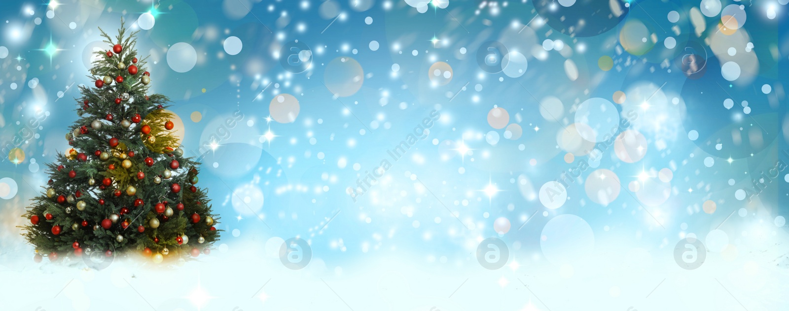 Image of Beautifully decorated Christmas tree on light blue background, banner design with space for text. Bokeh effect