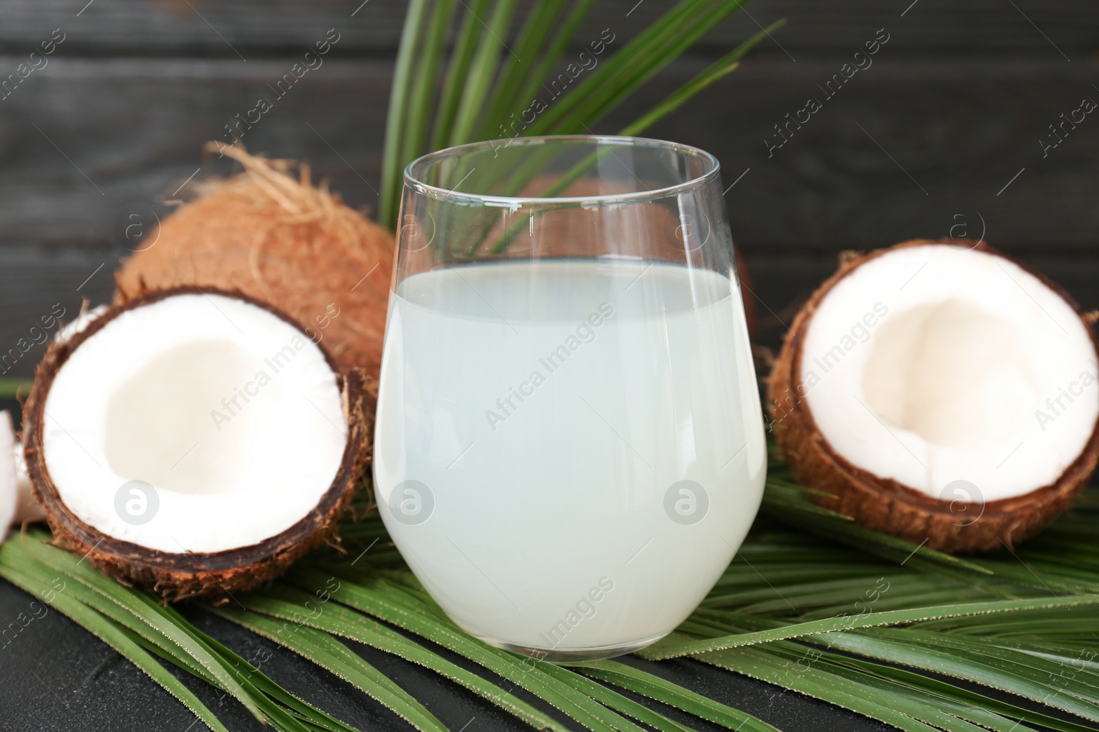 Photo of Glass of coconut water on table