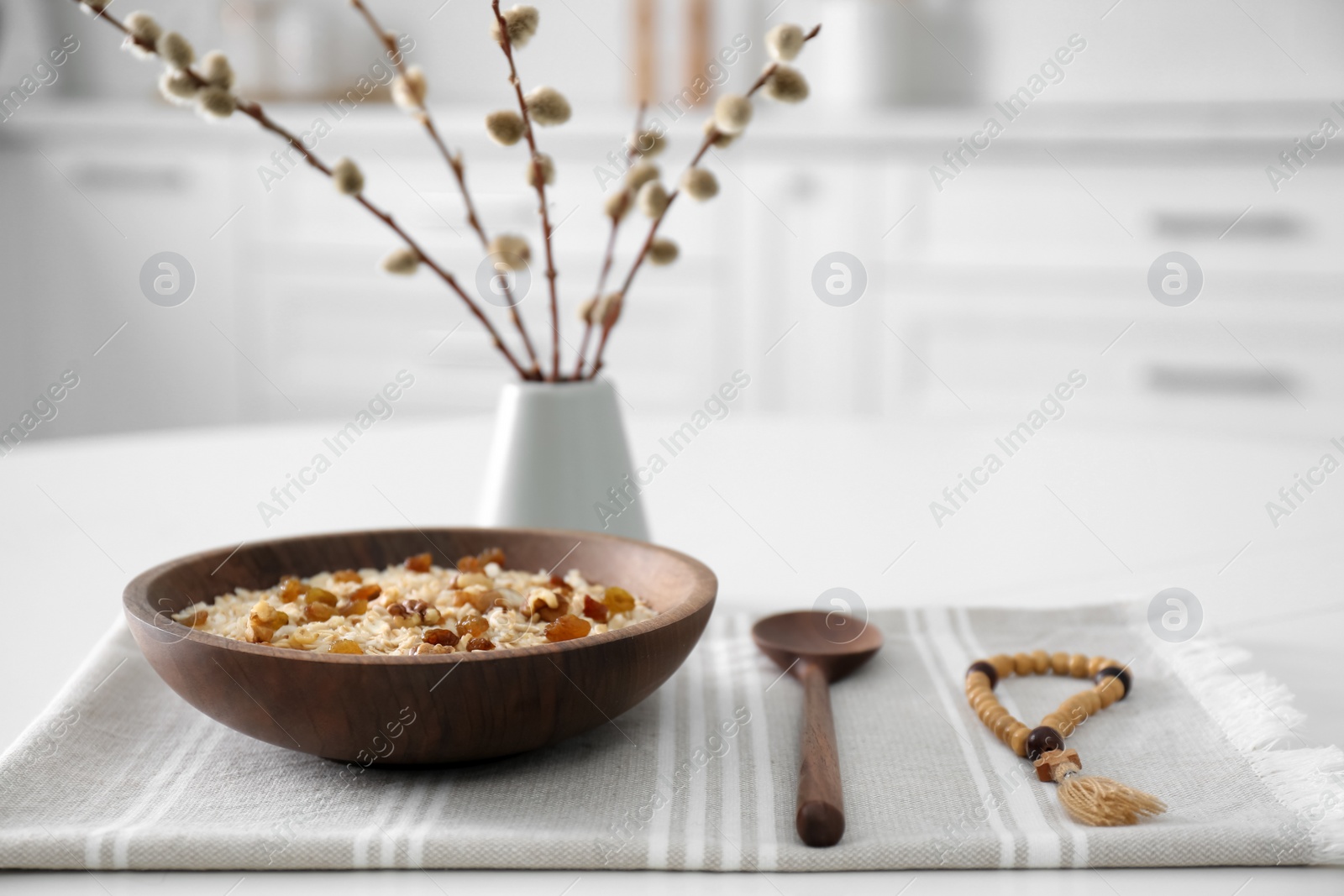 Photo of Great Lent dinner served on white table in kitchen