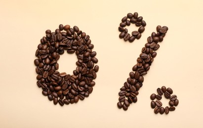 Photo of 0 percent made of coffee beans on beige background, flat lay. Decaffeinated drink