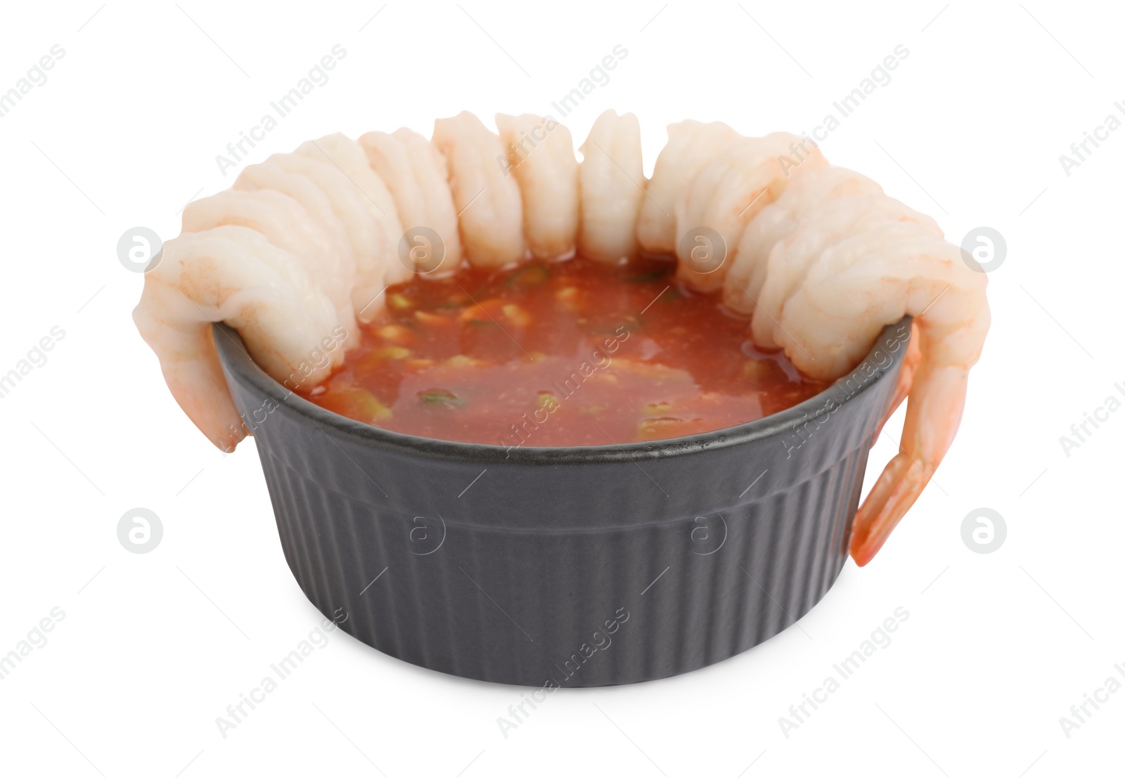 Photo of Tasty shrimp cocktail with sauce isolated on white