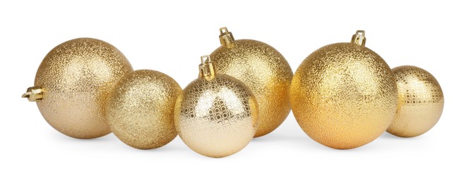 Photo of Beautiful golden Christmas balls isolated on white