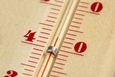 Photo of Weather thermometer showing high temperature, closeup view