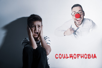 Image of Coulrophobia concept. Scared little boy and phantom of clown