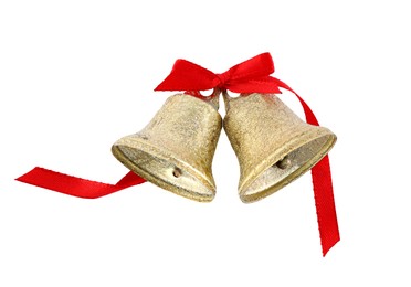 Photo of Golden shiny bells with red bow isolated on white. Christmas decoration