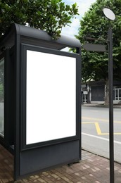 Photo of Blank advertisement board on public transport stop