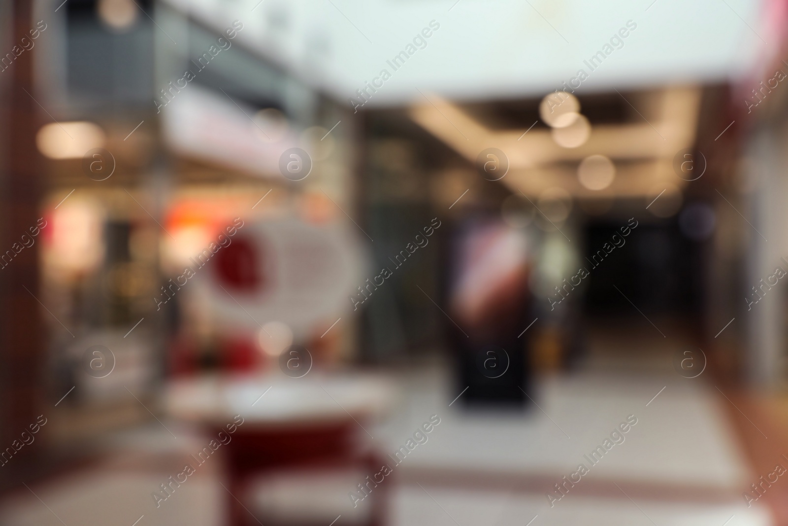 Photo of Blurred view of shopping mall interior. Bokeh effect