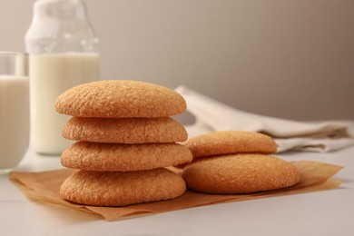 Photo of Delicious Danish butter cookies on white marble table, closeup