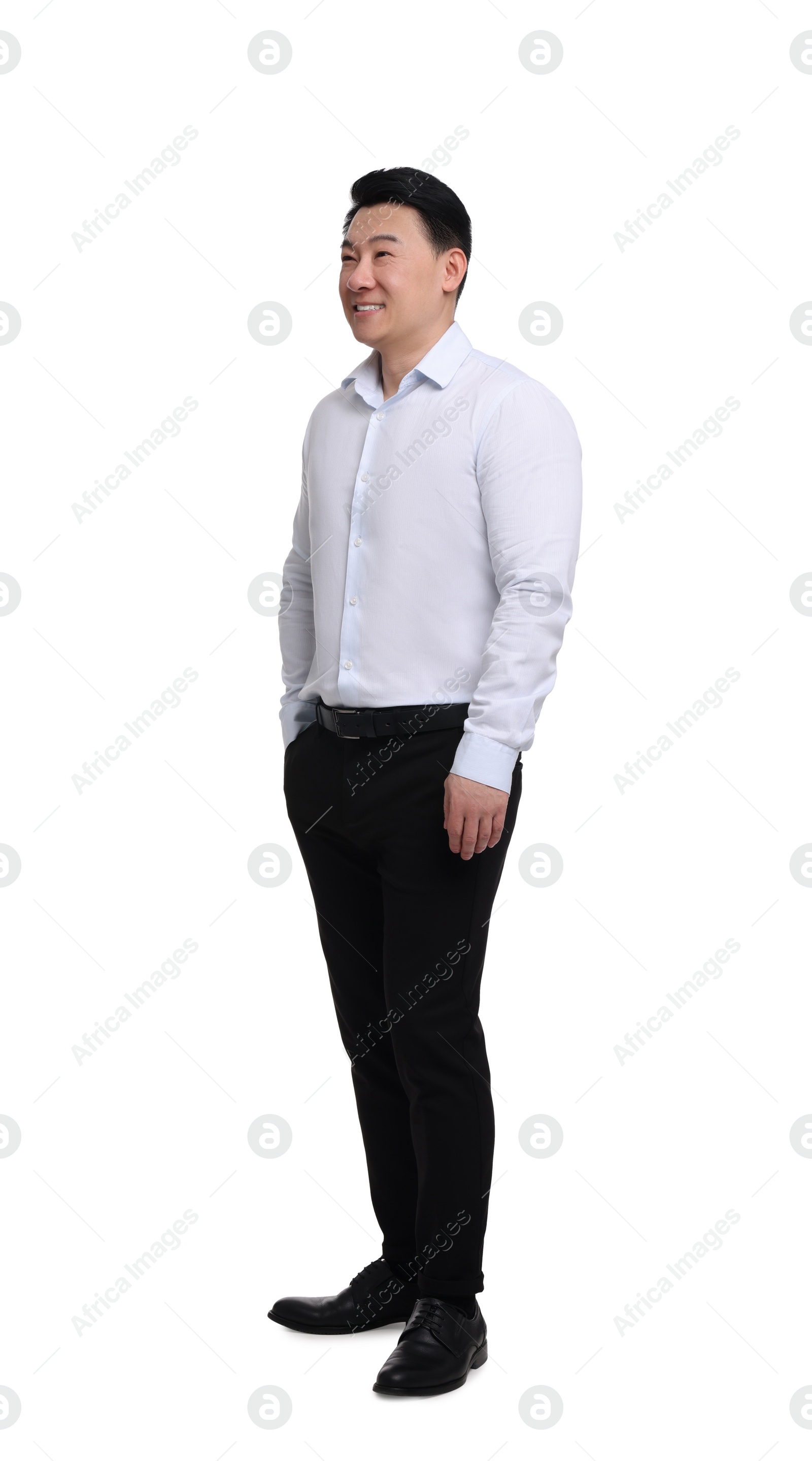 Photo of Businessman in formal clothes posing on white background