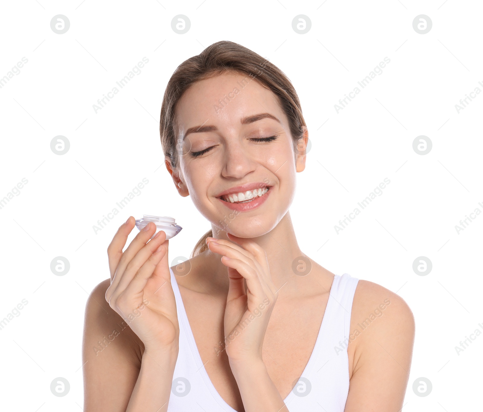 Photo of Portrait of young woman with jar of cream on white background. Beauty and body care