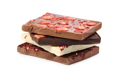 Photo of Chocolate bars with freeze dried strawberries on white background