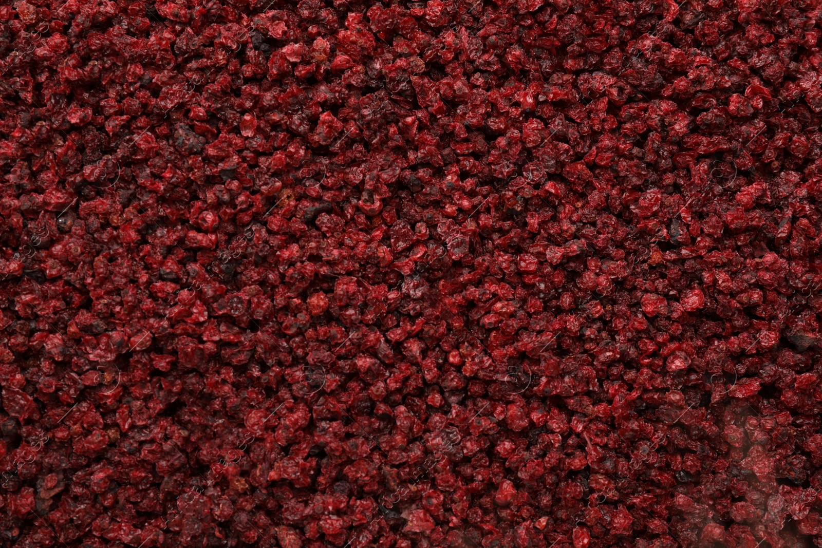 Photo of Dried red currants as background, top view