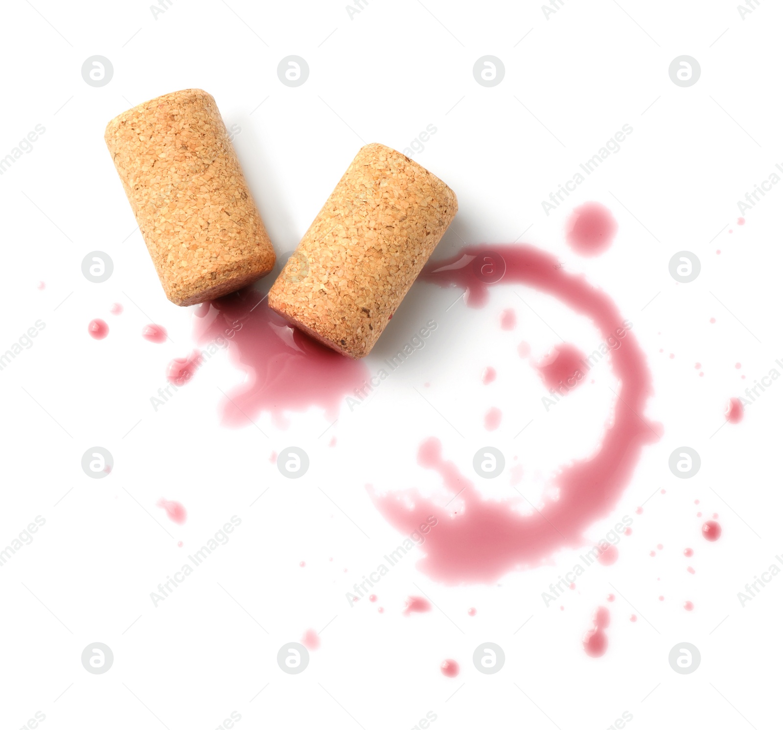 Photo of Bottle corks with wine stains on white background, top view