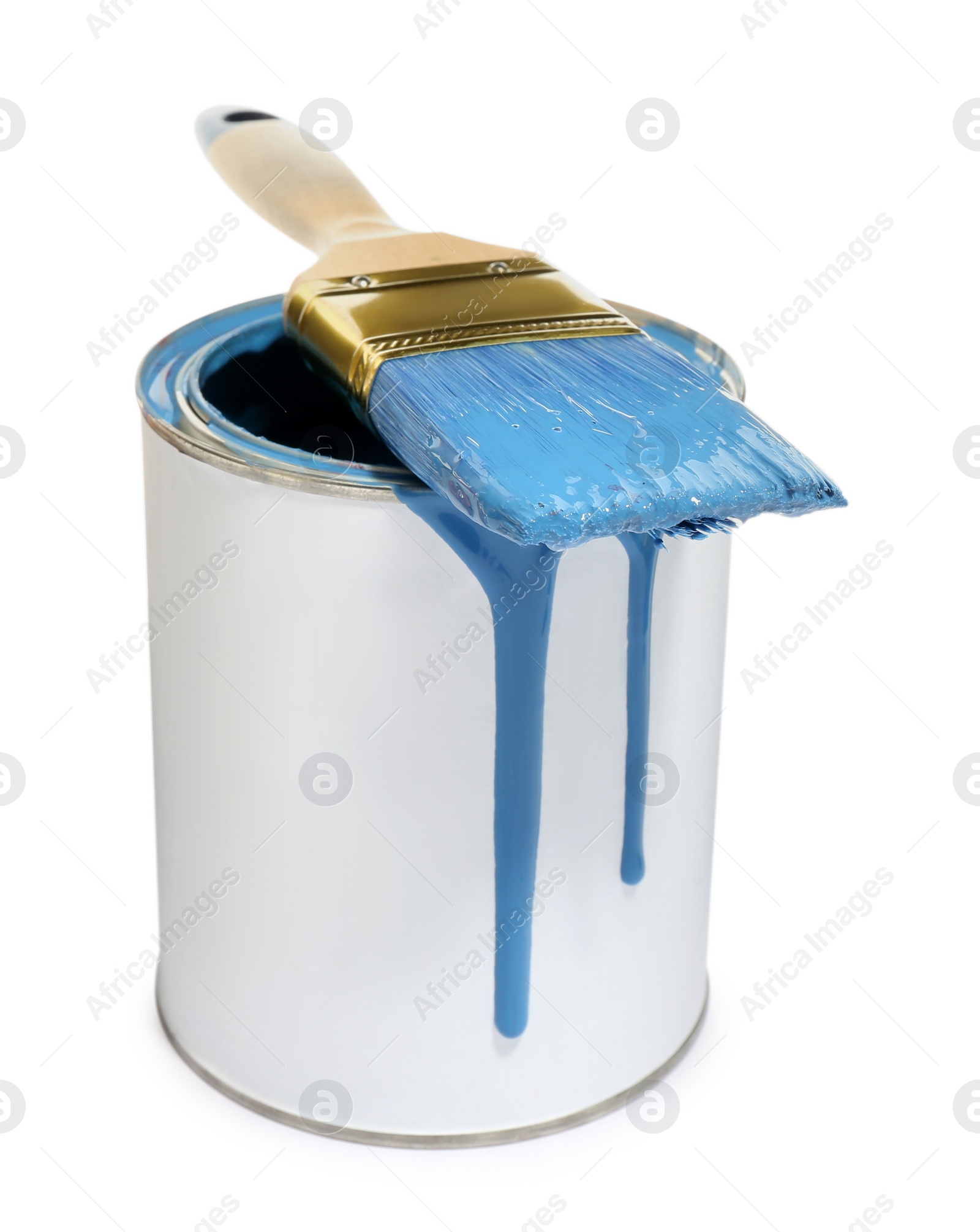 Photo of Can of blue paint with brush on white background