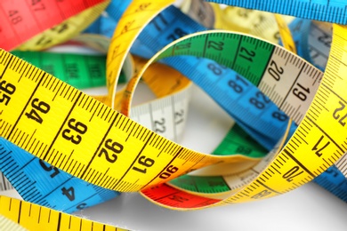 Photo of Different measuring tapes, closeup