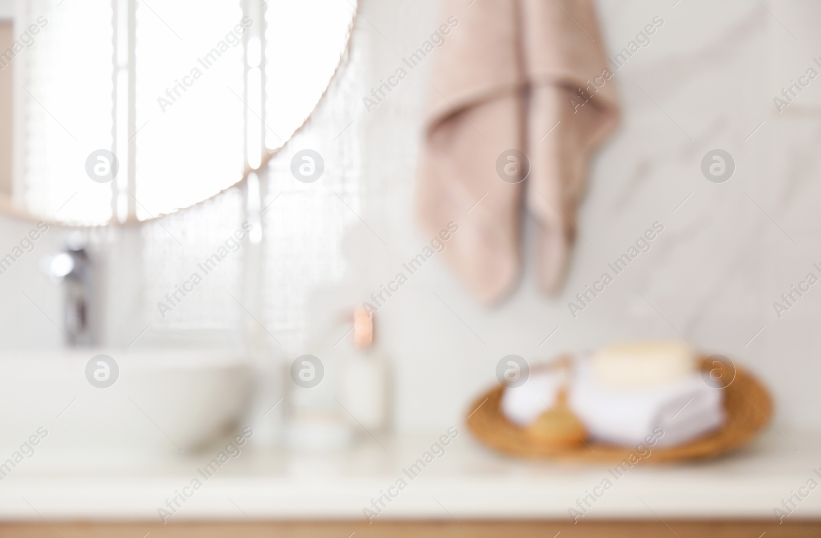 Photo of Blurred view of stylish modern bathroom with toiletries