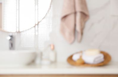Blurred view of stylish modern bathroom with toiletries