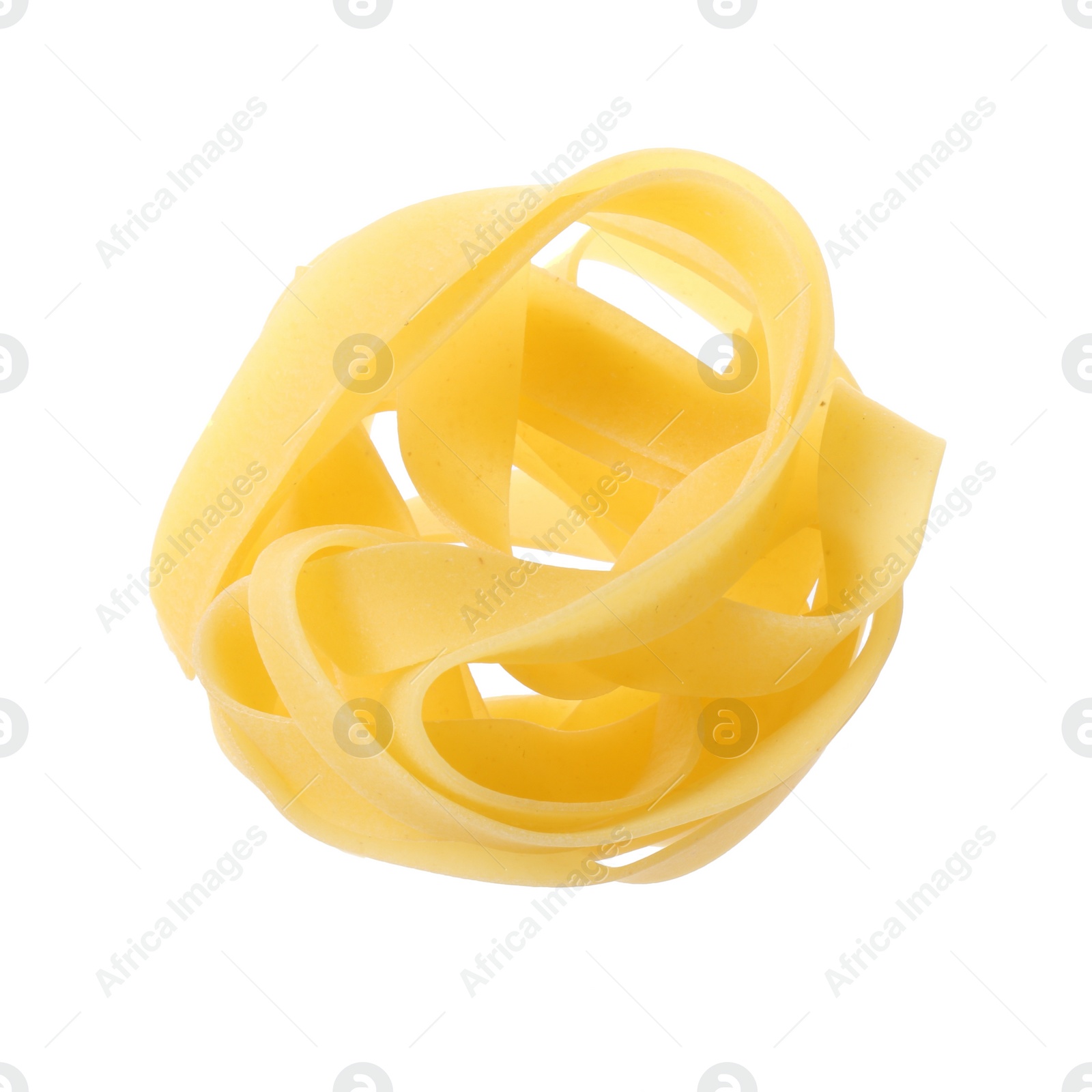 Photo of Raw fettuccine pasta isolated on white, top view