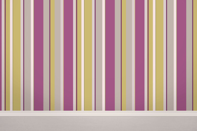 Image of Striped wallpaper and grey floor in room