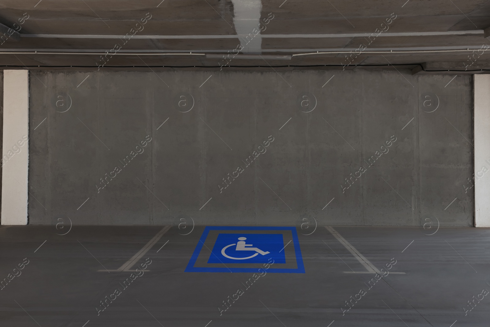 Image of Car parking garage with wheelchair symbol 