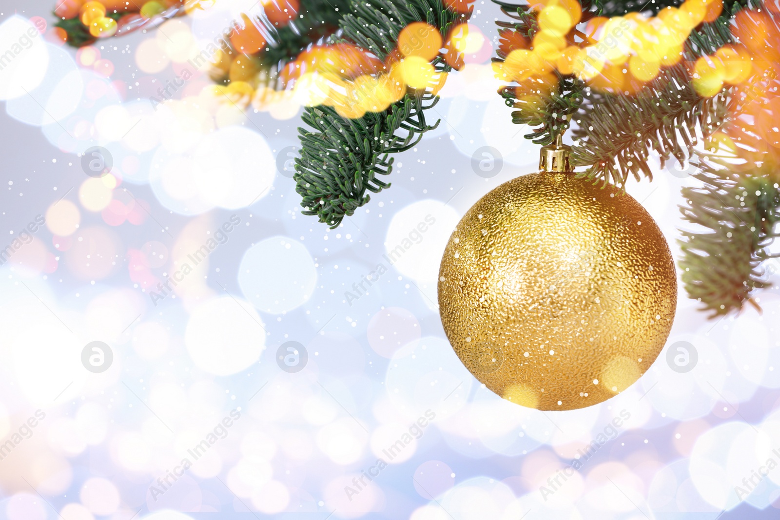 Image of Beautiful bauble hanging on Christmas tree against blurred lights, closeup view with space for text. Bokeh effect