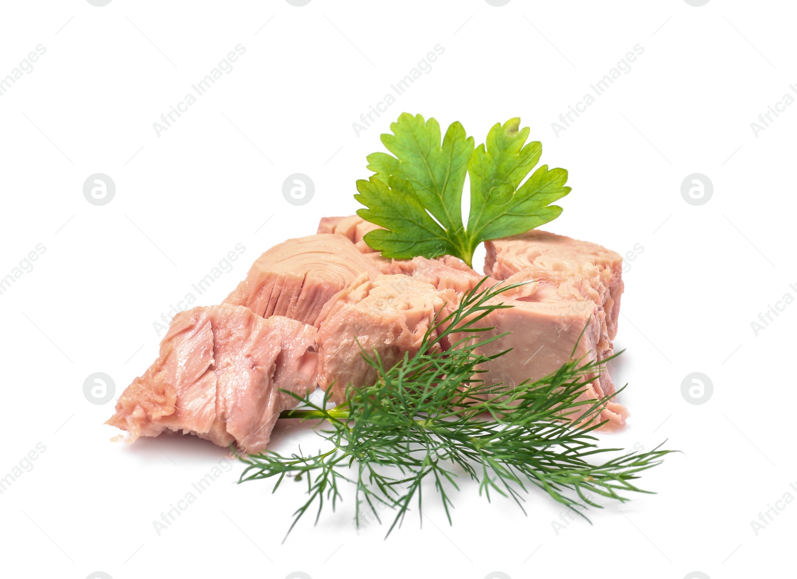 Photo of Pieces of canned tuna with dill and parsley on white background