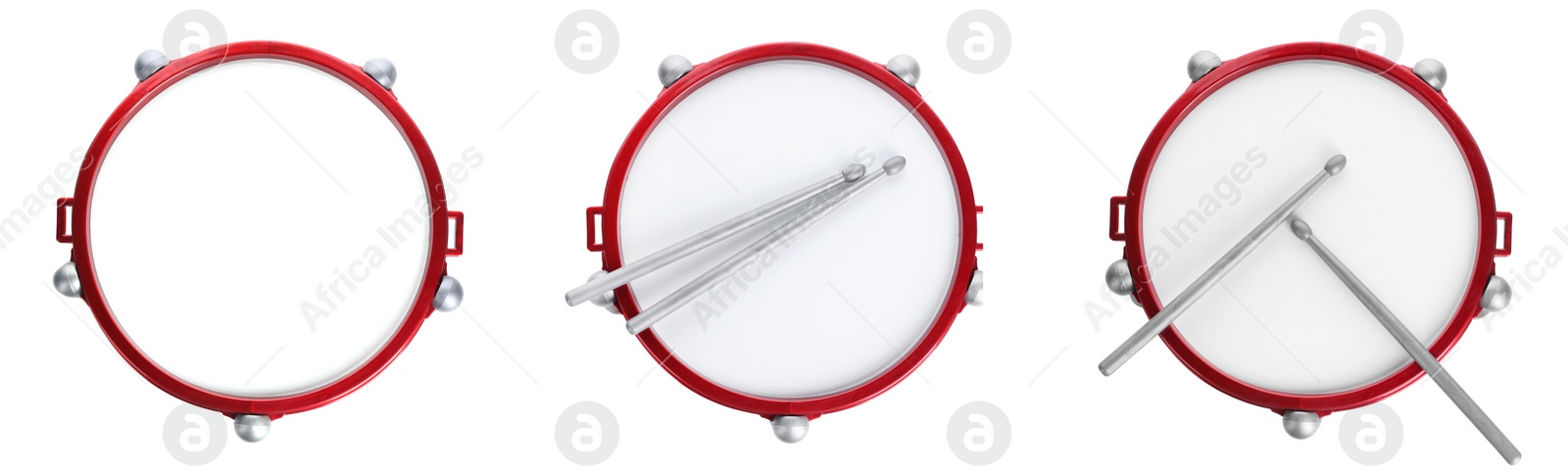 Image of Bright toy drums and sticks on white background, top view