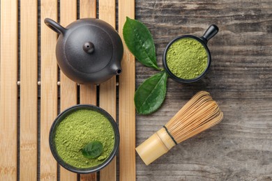 Photo of Flat lay composition with green matcha powder on wooden table