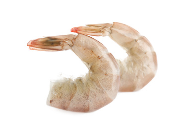 Photo of Fresh raw shrimps isolated on white. Healthy seafood