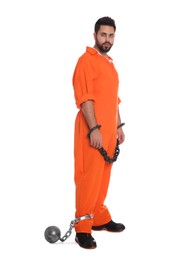 Photo of Prisoner in jumpsuit with chained hands and metal ball on white background