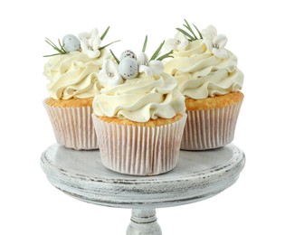 Photo of Tasty Easter cupcakes with vanilla cream isolated on white