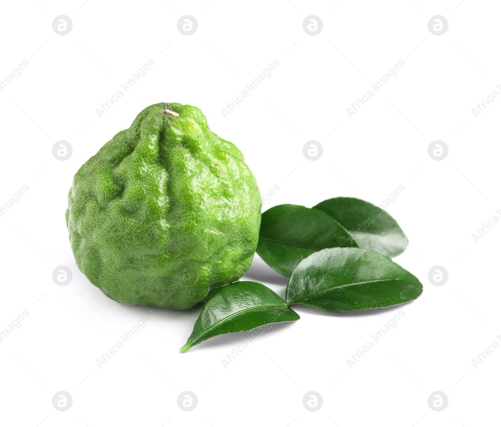 Photo of Fresh ripe bergamot fruit and green leaves on white background