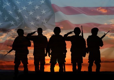 Image of Veterans Day. Silhouettes of military men on sunset outdoors and flag of USA, double exposure
