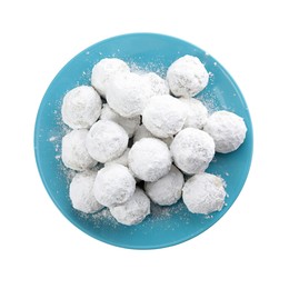 Photo of Tasty Christmas snowball cookies isolated on white, top view