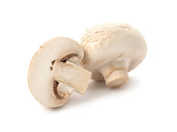 Photo of Fresh raw champignon mushrooms on white background