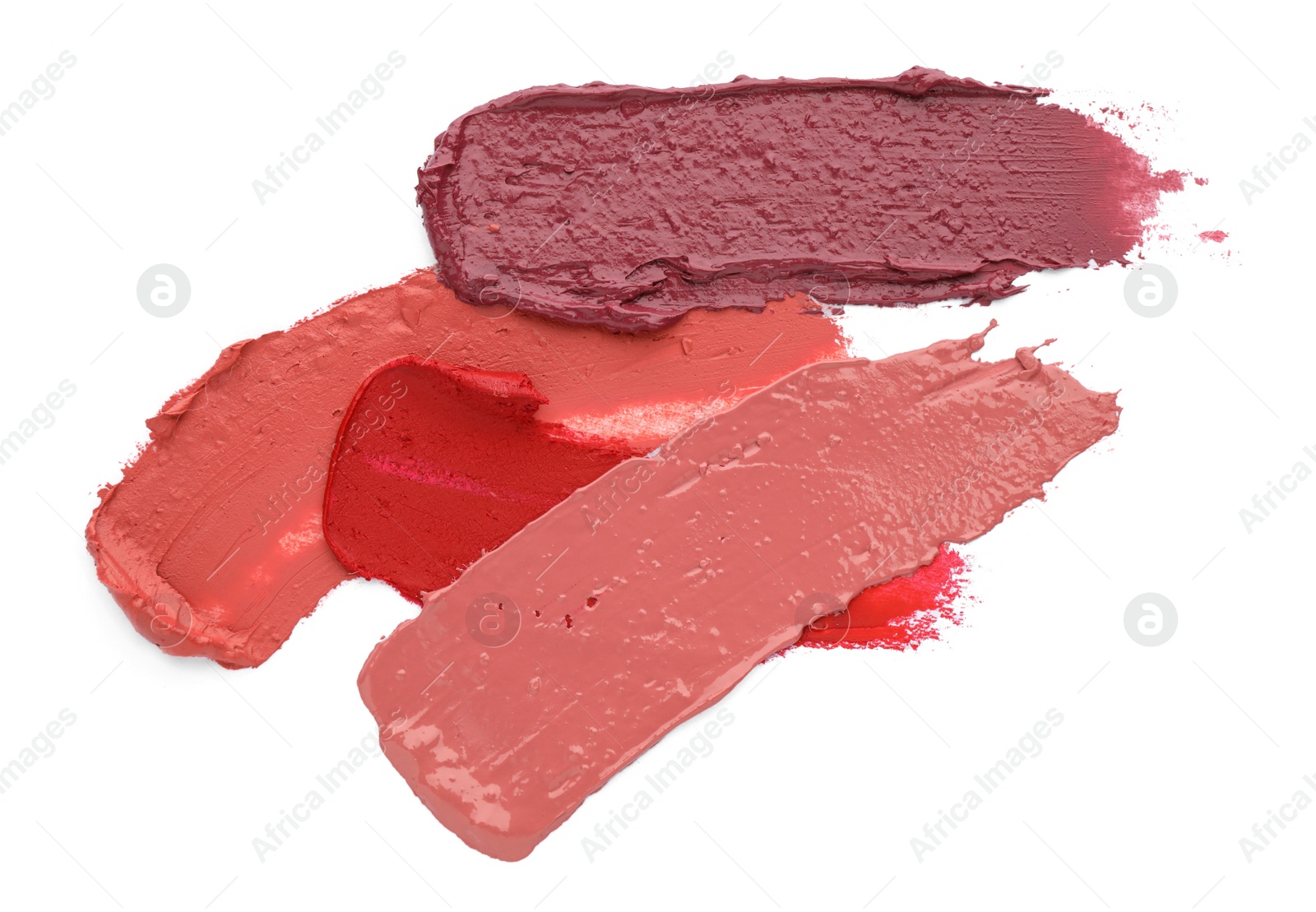 Photo of Collection of colorful lipstick smears on white background