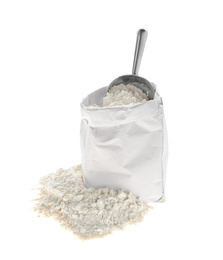 Photo of Organic flour and scoop in paper bag isolated on white