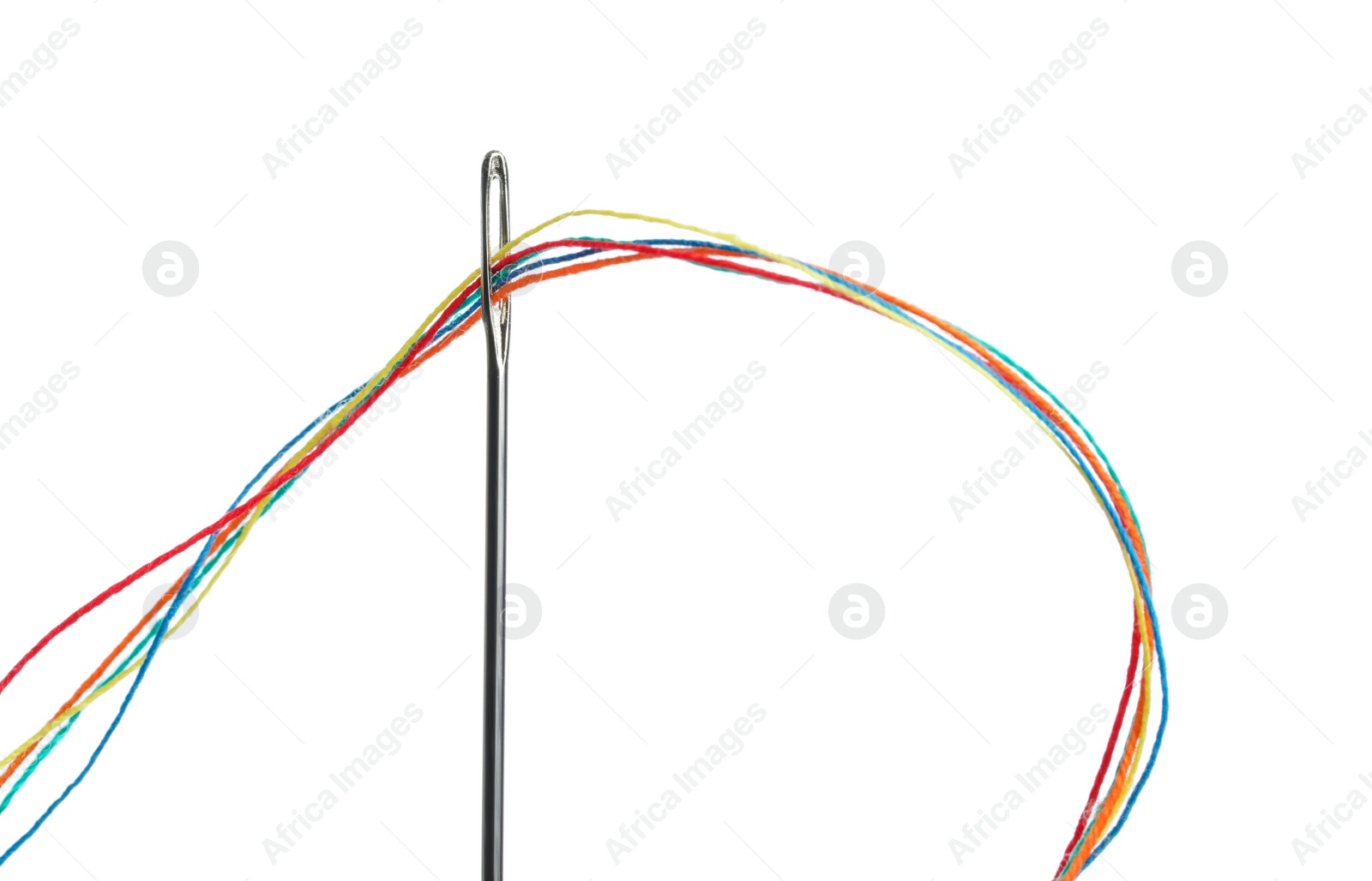 Photo of Sewing needle with colorful threads isolated on white
